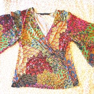 Wrap blouse with slit shoulder